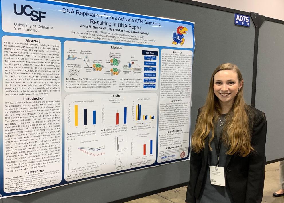 Poster presenter standing next to their poster at the 2019 ABRCMS Conference