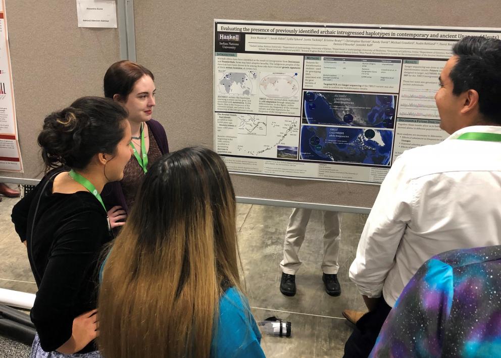 Student presenter discusses their project at SACNAS Conference poster session